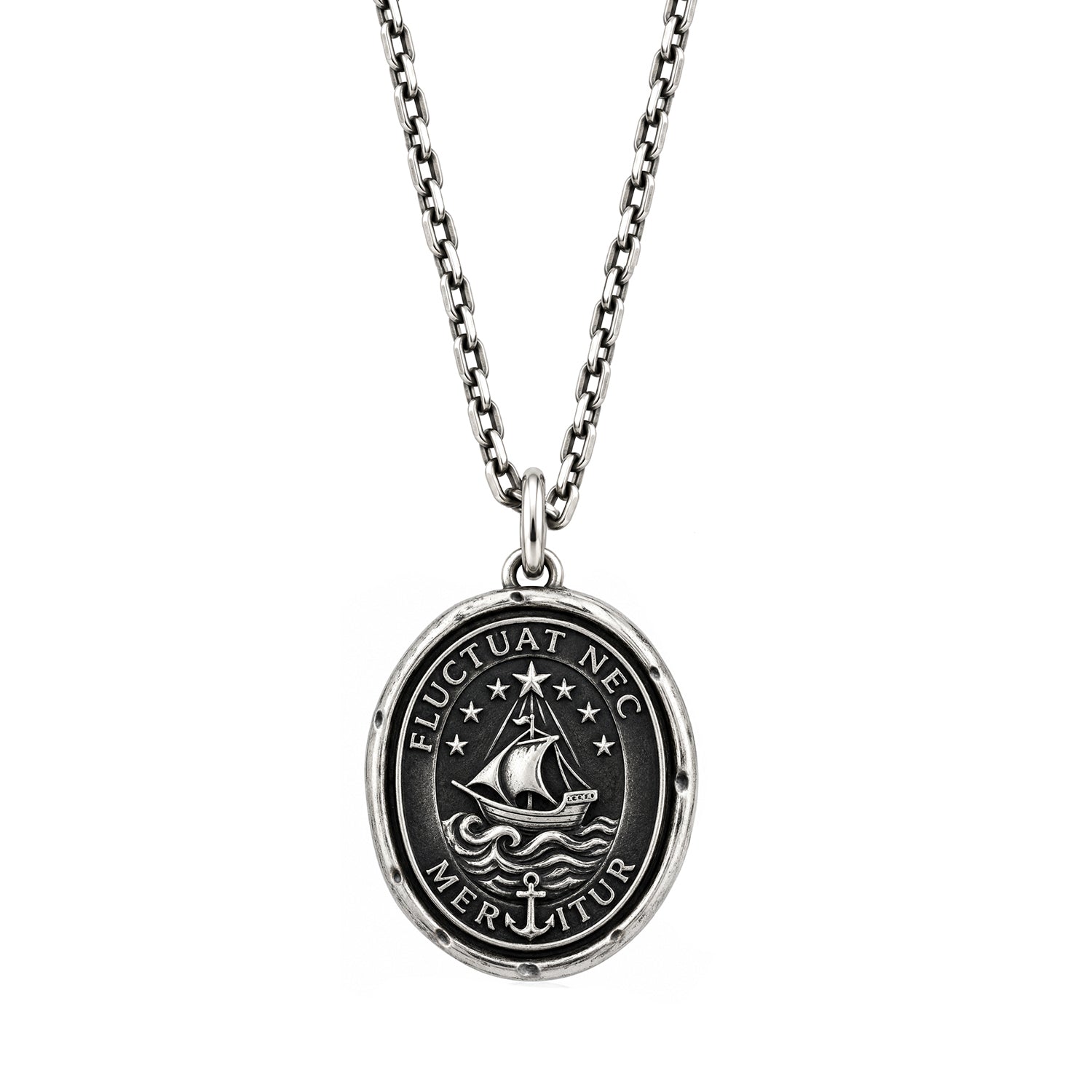 Weather the Storm oval talisman pendant with a sailing ship, waves, stars and anchor, on a chain against a white background.
