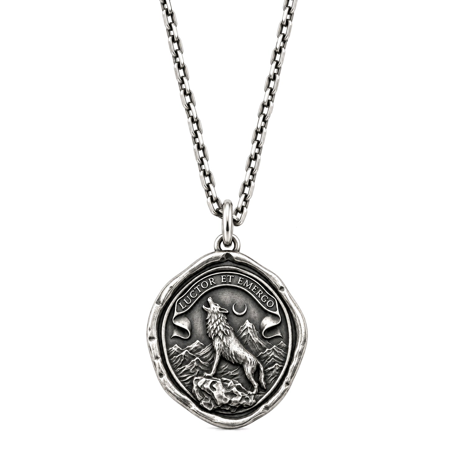 Rise Above wolf talisman pendant with mountain and crescent moon design on a chain, against a white background.